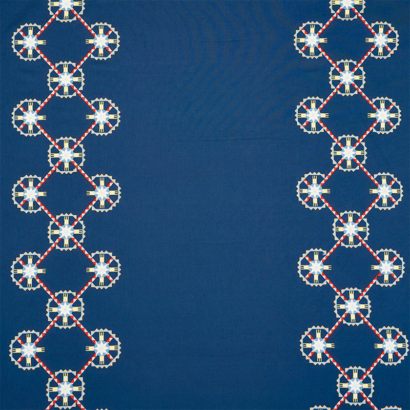 Schumacher CHAMIZAL EMBROIDERY BLUE & RED Fabric | Atlanta Fabrics