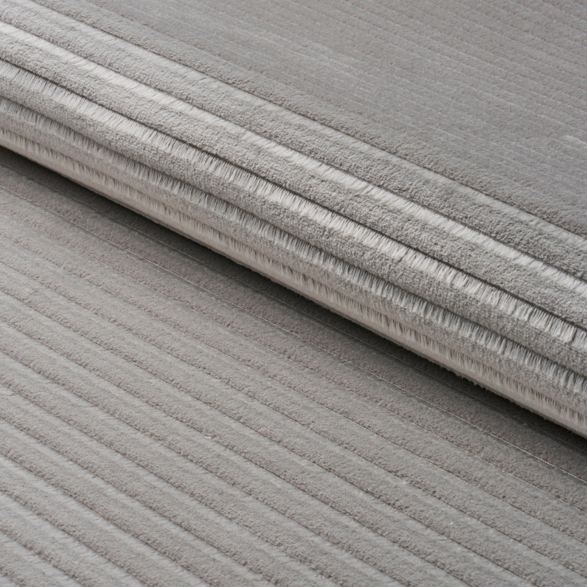 Schumacher PETITE CHANNELED VELVET OTTER GREY Fabric | Atlanta Fabrics